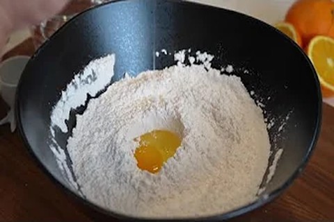 Coating the chicken in batter and preparing the orange sauce base