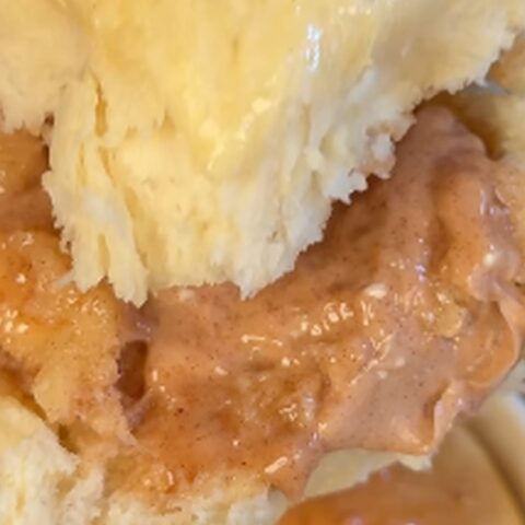 Warm golden copycat Texas Roadhouse rolls with melting whipped cinnamon butter