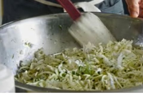 drizzling-olive-oil-vinegar-cava-slaw