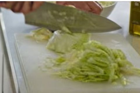thinly-slicing-cabbage-for-sumac-slaw