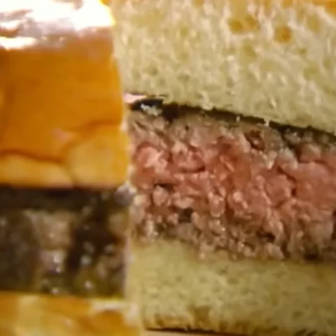 Gordon Ramsay burger recipe with toasted brioche bun and juicy beef patty sliced open