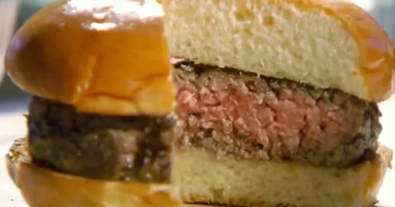 Gordon Ramsay burger recipe with toasted brioche bun and juicy beef patty sliced open